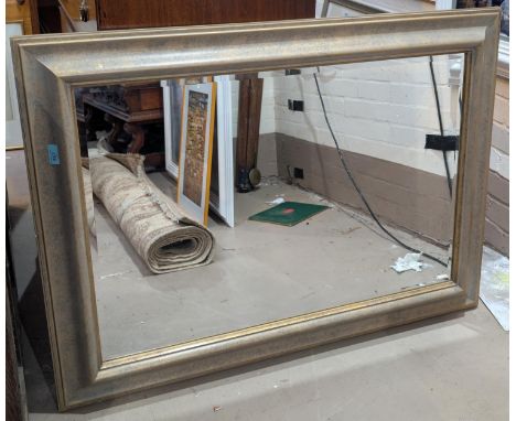 A John Lewis antique style, aged, gilt framed wall mirror, 79 x 109 cm + a green baize fold away card table.