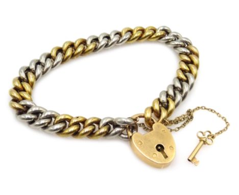 Platinum and 18ct gold (tested) curb chain bracelet with key and padlock, approx 33.7gm Condition Report Click here for furth