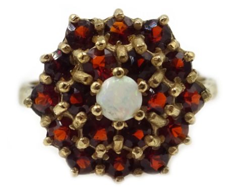 9ct gold garnet and opal cluster ring, hallmarked  Condition Report Approx 4gm, size N-OClick here for further images, condit