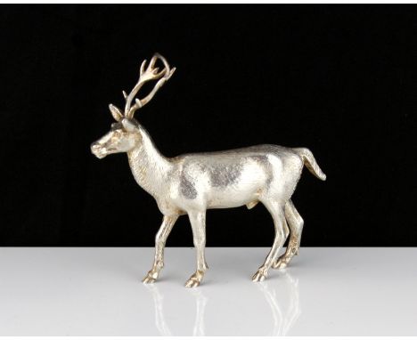 A vintage Sterling Silver statue of a stag by A E Jones, Birmingham 1973 designed to depict a stag in detail. Length 13cm / 5
