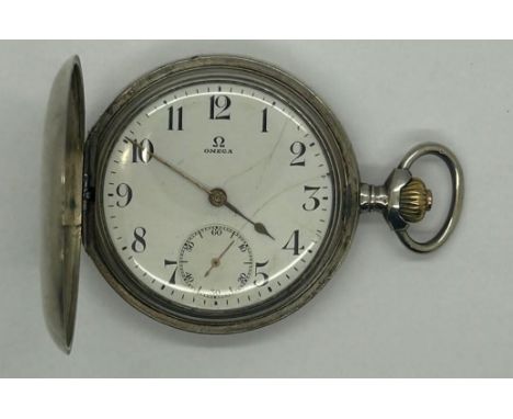 OMEGA: 800 silver cased full hunter crown wind pocket watch with date aperture, working at lotting, with cardboard explanator