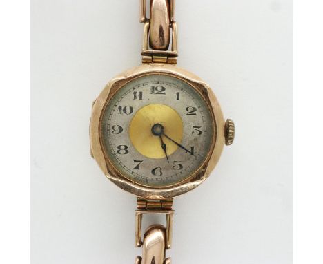 9ct gold cased ladies wristwatch on a 9ct gold expanding bracelet, total weight 19.3g, not working at lotting, bracelet requi