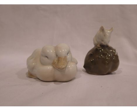 Royal Copenhagen figurine of a mouse on a chestnut designed by Erik Nielsen, together with ducklings, no cracks or chips, lar