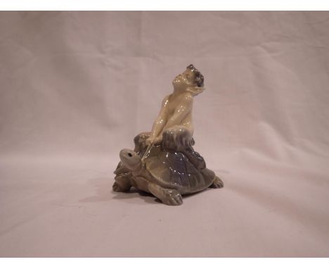 Royal Copenhagen figurine of a fawn riding a tortoise, no cracks or chips, H: 90 mm. UK P&amp;P Group 1 (£16+VAT for the firs