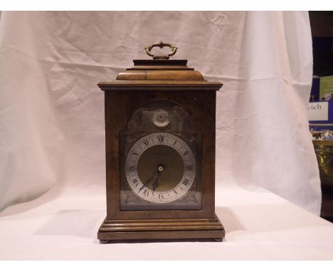 Elliott burr walnut cased table clock for Boodle &amp; Dunthorne, not working at lotting, H: 27 cm. UK P&amp;P Group 3 (£30+V