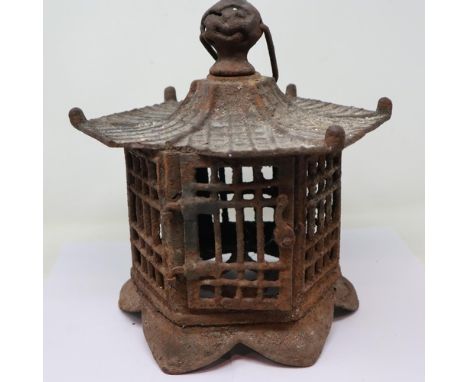 Late 19th/early 20th century Chinese cast metal hanging cage or lantern in the form of a Pagoda, damage to roof, H: 27 cm. UK