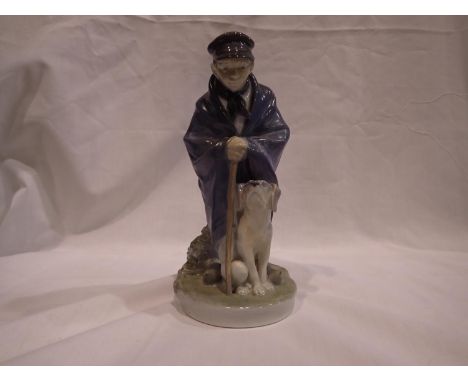 Royal Copenhagen figurine of a boy and dog, no cracks or chips, H: 20 cm. UK P&amp;P Group 1 (£16+VAT for the first lot and £