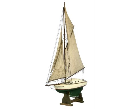 VINTAGE WOODEN POND YACHT with green and cream painted hole, fully rigged, 114cms (h) included standProvenance: private colle