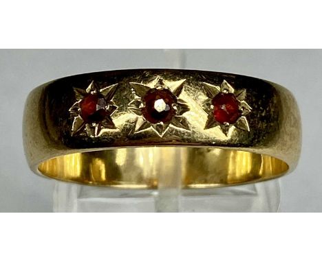9CT GOLD RING set with three small rubies, size U, 4.8gmsProvenance: deceased estate Conwy