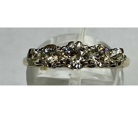 YELLOW METAL RING set with band of five diamonds, total approx. 1.0 carat, size PProvenance: deceased estate Conwy