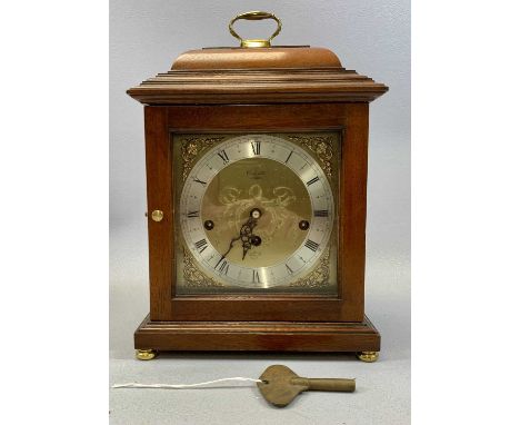 COMITTI OF LONDON MAHOGANY STYLE BRACKET CLOCK, silvered chapter ring, Roman numerals, Franz Hermle 8-day movement with Westm