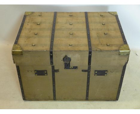 A late 19th/early 20th century brass bound canvas trunk, with label for Bick &amp; sons Cheltenham, H.52 W.97 D.54cm 