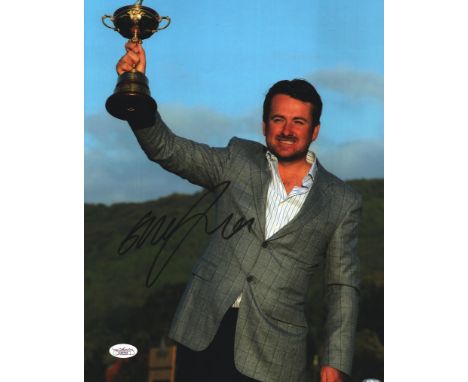 Graeme McDowell signed 16x12inch colour photo with the Ryder cup. Good condition. All autographs come with a Certificate of A