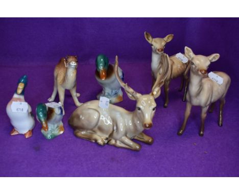 Four Beswick studies, Doe 999A x2. Stag, lying 954 (af) and Duck 919A along with two similar studies of Mallard Ducks and a W