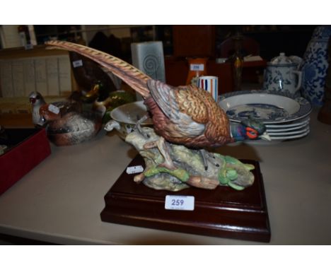 A ceramic figure of a pheasant by Coalport limited run no. 124 of 750
