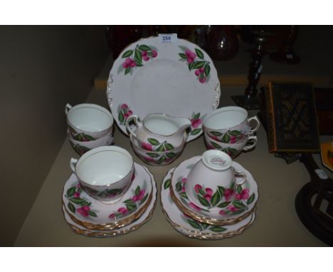 A part tea service by Colclough having a pink and floral design