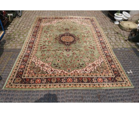 Very Large Green Ground Persian Style rug with floral borders, 340 x 240cm