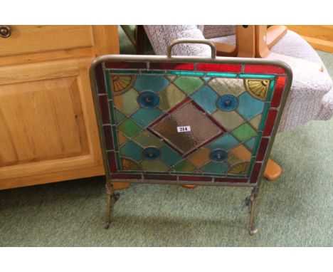 Edwardian Brass Leaded glass fire screen on scroll feet 