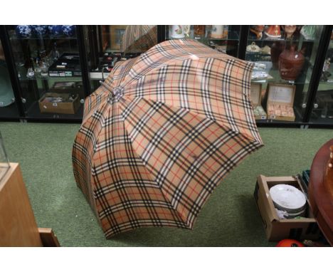 Vintage Burberrys Umbrella with lightwood handle. 97cm in Length 