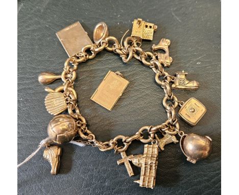 9ct Gold Charm bracelet of assorted charms 42g total weight&nbsp;