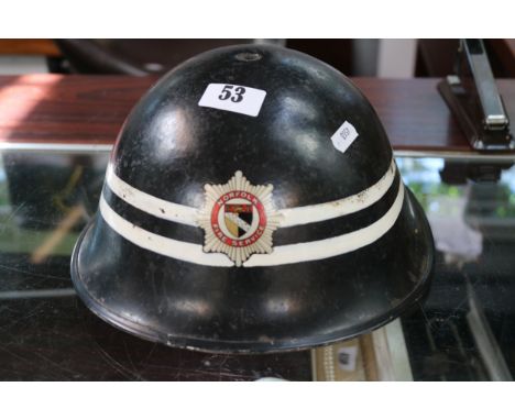 Vintage Norfolk Fire Service Tin fire Helmet with liner and chin strap. 