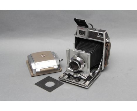 A Linhof Technika Camera, with Schneider Tele-Xenar f/5.5 180mm lens and Super Rollex back (a lot)