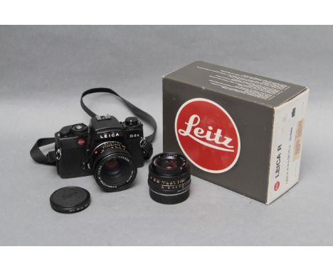 A Leica R4s SLR Camera, together with Leitz Summicron-R f/2 50mm and Leitz Elmarit-R f/2.8 28mm lenses, body in maker's box