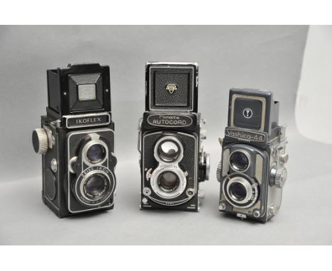 A Minolta Autocord TLR Camera, together with Yashica-44 and Zeiss Ikon Ikoflex (3)
