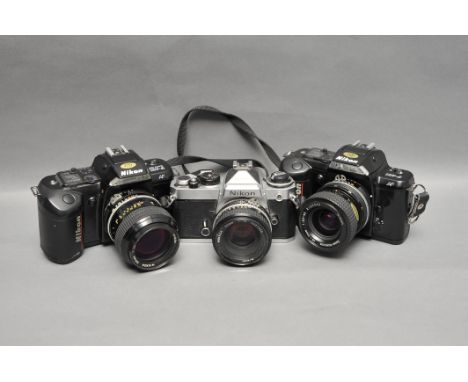 A Nikon FE SLR Camera, together with two Nikon F-401 Cameras with manual focus lenses (3)
