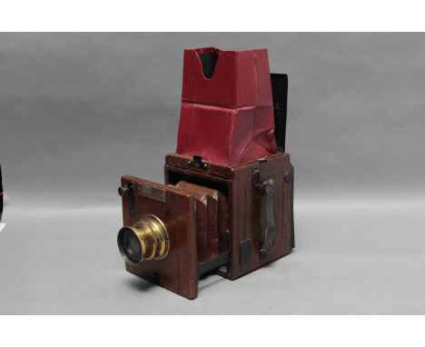 An Ensign Special Reflex Camera, marked 'Tropical' to name plate, however mahogany-bodied, viewing hood replaced, with Thornt