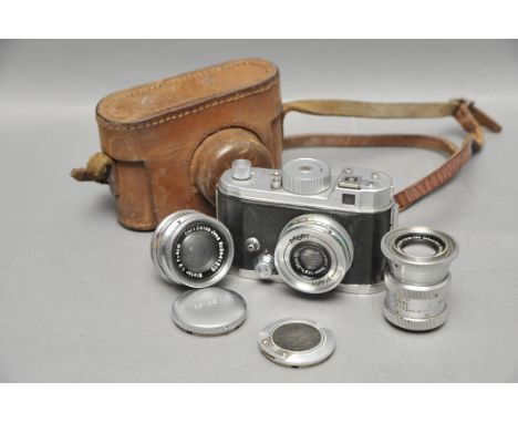 A Berning Robot II Camera, with three lenses, in maker's case