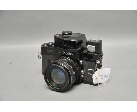 A Minolta X-1 SLR Camera, black, with Makinon f/2.8 28mm lens