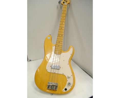 Electirc Guitar, A vintage Sakai bass with natural finish, in good condition control knobs not matching   