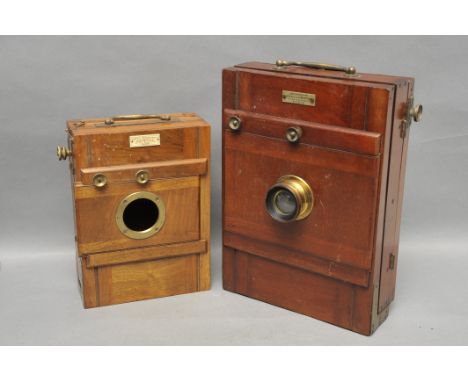 A Soleil du Dimanche Mahogany Tailboard Camera, with rotary Waterhouse stop brass lens, together with a Hermagis tailboard bo