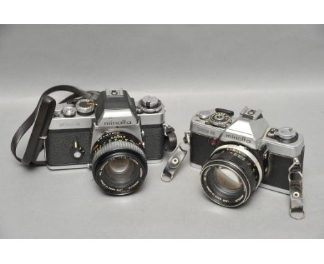 A Minolta XE-1 SLR Camera, together with a XG2, both with f/1.4 50mm lenses (2)