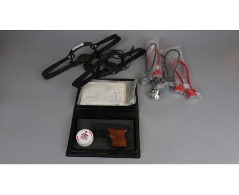 2 gin traps with gun dog training pistol and gun padlocks 