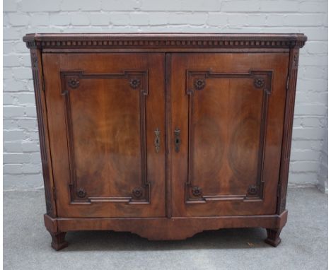 An 18th century Dutch mahogany buffet, the foldout shelf back over a pair of panelled doors, 118cm wide x 100cm high. 