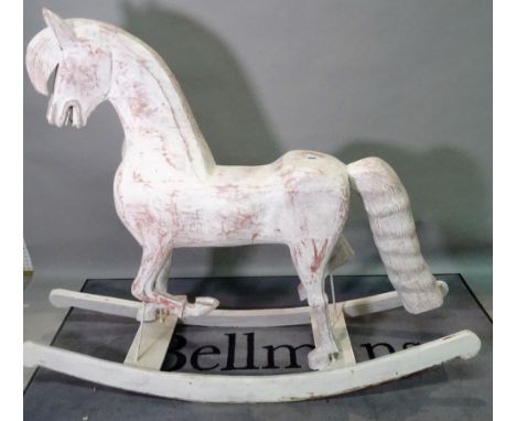 A modern white painted rocking horse of large proportions, 190cm wide x 149cm high. 
