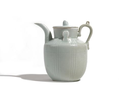 A Chinese qingbai ewer and a matched cover, probably Song dynasty, the bulbous body incised with vertical lines, covered in a