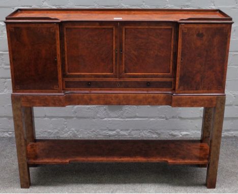 A late 19th century burr yew top to a lady's bonheur du jour, with various drawers and cupboards on later stand, 88cm wide x 