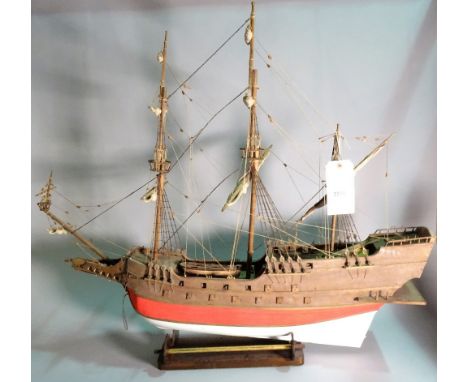 An early 20th century wooden model of a triple mast galleon, 97cm wide x 87cm high. 