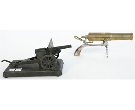 A brass novelty canon model on an iron pistol gripped frame, 20th century, with two piece mother-of-pearl handle, 24.5cm and 