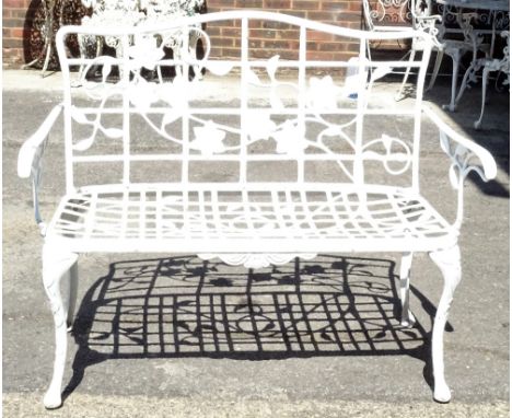 A modern white painted metal garden bench, 115cm wide x 92cm high. 