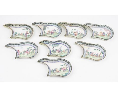 A set of eight Canton enamel famille-rose hors d'oeuvres dishes, 19th century, each painted with figures in a landscape, 18cm