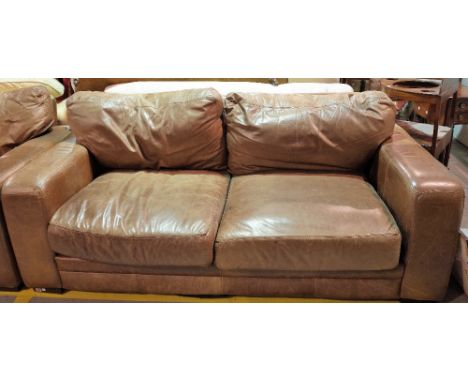 A modern brown leather sofa on block feet, 200cm wide. 