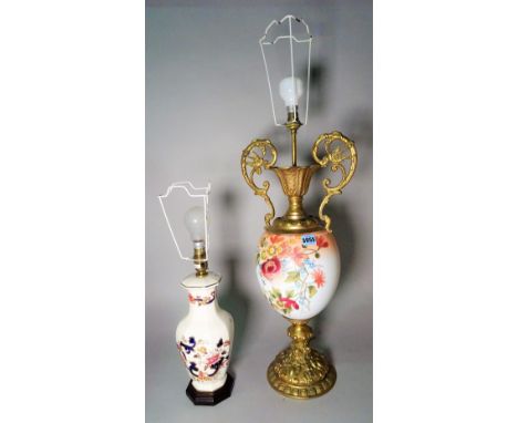 A modern gilt metal mounted and porcelain table lamp, 73cm high, and another modern ceramic table lamp, 45cm high. (2) 