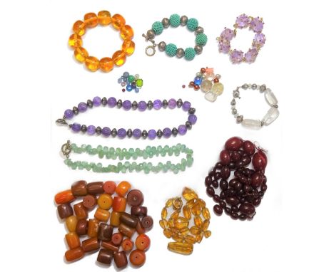 An amethyst quartz bead necklace, two further stone bead necklaces, an amethyst quartz bracelet, two further bracelets, a sim