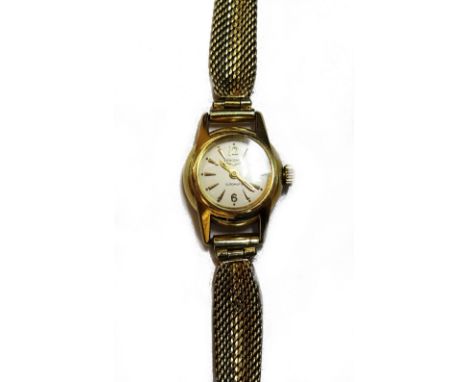 A Longines Automatic gold circular cased lady's wristwatch, with a signed jewelled movement, detailed Longines Swiss, the sig
