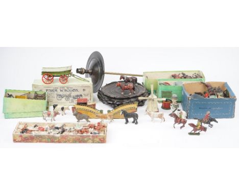 A quantity of Britains hollow-cast lead figures and accessories from the farm range, also including a part hunting set and mi