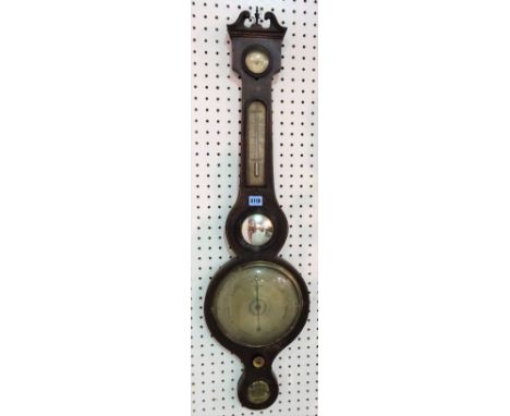 An early 20th century mahogany wheel barometer, 29cm wide x 95cm high.